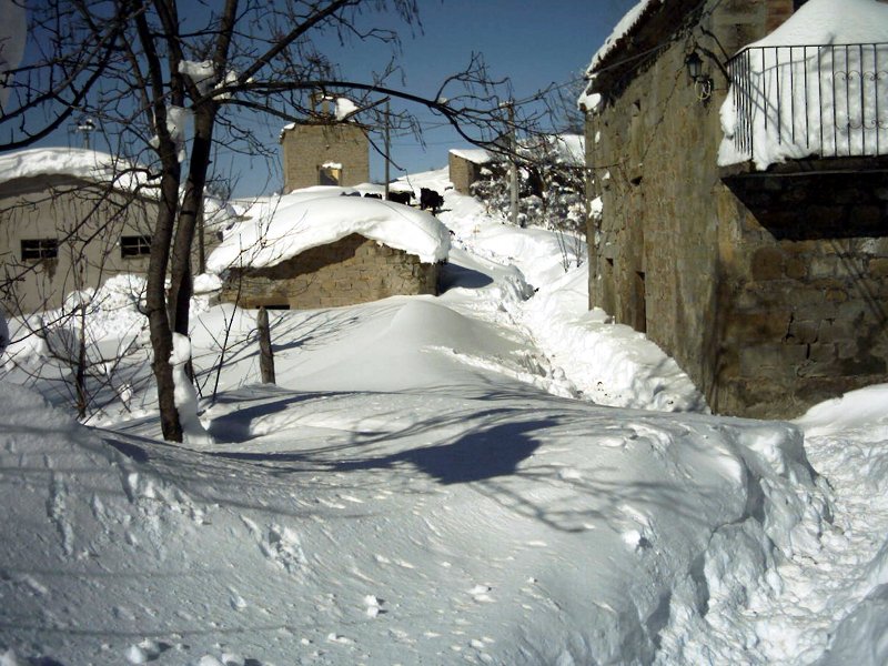 Snow-clad country hamlet of Serra